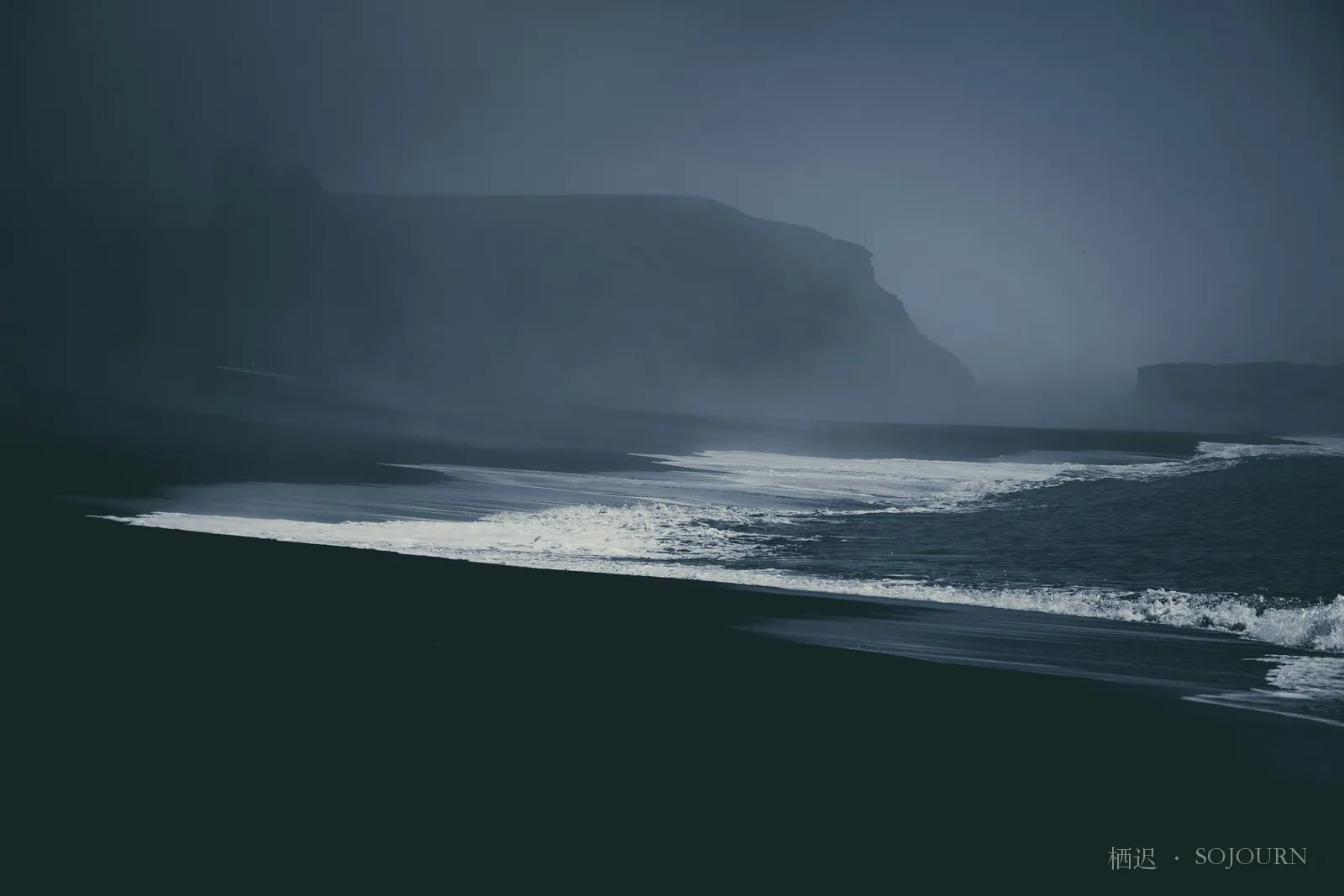 Mist on the black sand