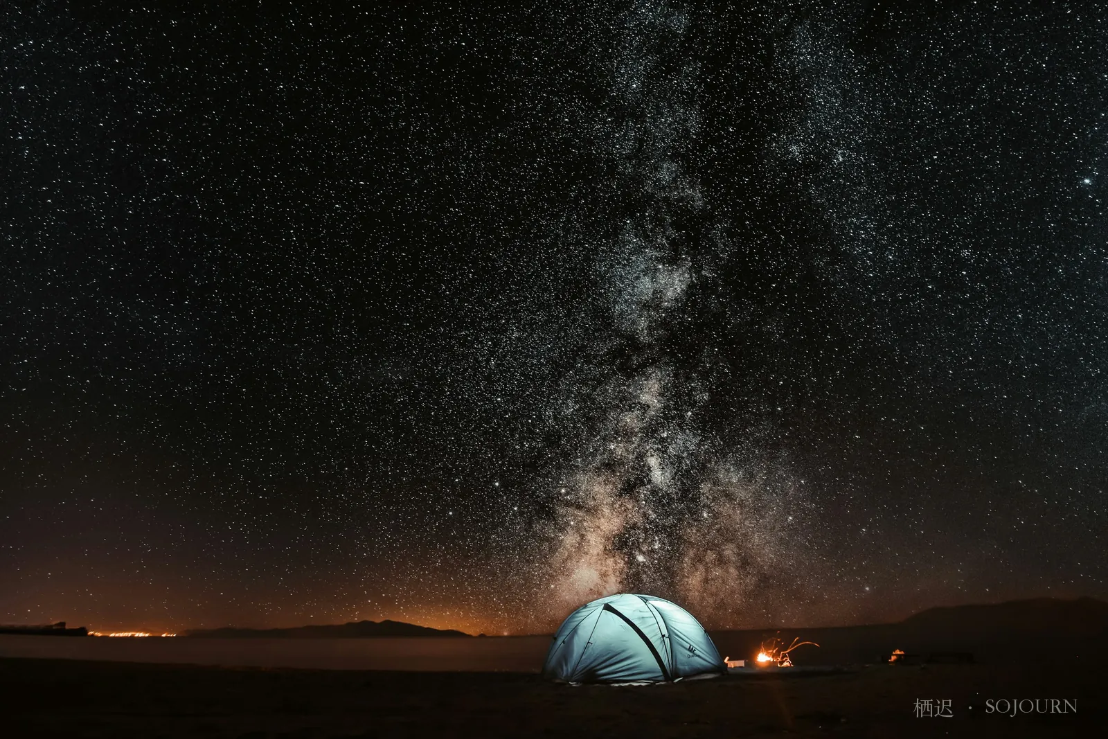 A tent beneath the Milky Way